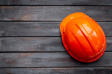 Engineer safety helmet overhead view. Construction background