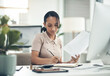 © N Felix/peopleimages.com - Filing her annual taxes. Shot of a young businesswoman calculating finances in an office.