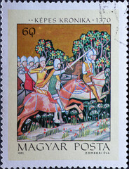 Wall Mural - HUNGARY - CIRCA 1971: a postage stamp from HUNGARY, showing a historical painting Aba Sámuel pursuing King Peter Orseolo. Circa 1971