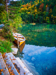 Canvas Print - Autumn lake with clouds and forest