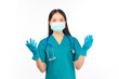 © Png - Video - Photo - portrait asian female doctor in scrubs standing fingers protection flu cold facial with mask wearing surgical gloves