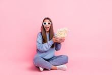 Portrait Of Attractive Cheerful Funky Girl Sitting Throwing Eating Corn Having Fun Isolated Over Pink Pastel Color Background