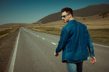 Wall Mural - guy walking on highway