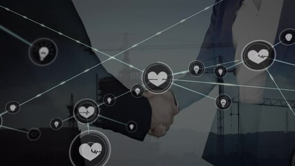 Wall Mural - Animation of network of connections with icons over people shaking hands