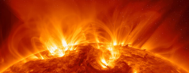 Fotomurales - Our star with magnetic storms. Plasma flash on the surface of a our star with lot of stars 