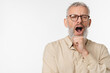 © InsideCreativeHouse - Yawning sad bored tired exhausted caucasian mature middle-aged businessman teacher freelancer feeling negative emotions, wants to sleep, depressed isolated in white background