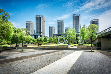 Poster - Buildings and green parks in a modern big city