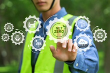 Net Zero And Carbon Neutral Concept.NET ZERO Icons And Symbols Save The Eco World And Reduce Pollution. Environmental Engineering Touching Green Net Zero Icon And Green Icon On A Green Background.