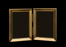 Old Hinged Double Picture Frame Close-up Isolated On Black Background