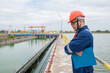 © reewungjunerr - Water plant maintenance technicians, mechanical engineers check the control system at the water treatment plant.