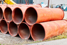 Construction Pipes Stacked On An Open Warehouse
