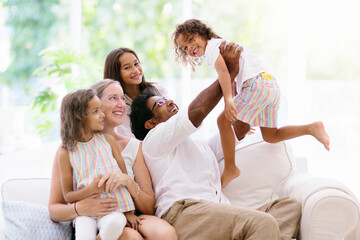 Beautiful family with kids at home