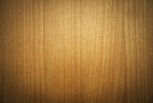 Photo Of A Wood Texture With Vertical Dark Stripes In The Style Of The 80s. Wooden Veneer For Furniture Decoration. The Background Is Made Of Light-colored Wood.