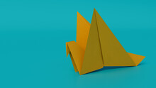 Bird Made From Folded Yellow Paper Against Turquoise Background. Origami Concept With Copy Space.