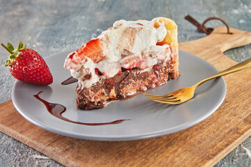 Poster - Piece of dream cake with chocolate biscuits and strawberries. French gourmet food