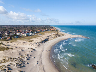 Liseleje, Denmark - April 4, 2020: Aerial drone view of the beach and the village at Liseleje