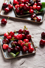 Canvas Print - Fresh sweet cherry with green leaves