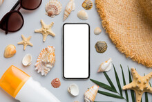 Flat Lay Composition With Phone And Beach Accessories On Colored Background. Smartphone With Blank Screen Mock Up With Copy Space