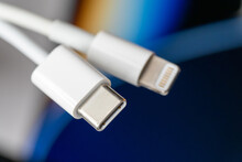 Close Up Of USB-C And Lightning Male Cables                              