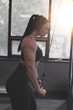 Muscular bodybuilder woman triceps workout