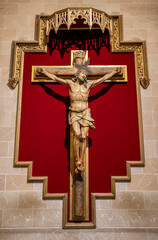 VALENCIA, SPAIN - FEBRUAR 17, 2022: The detail of  Crucifixion statue in the church Basilica de San Vicente Ferrer by  Carmelo Vicent Suria form 20. cent.