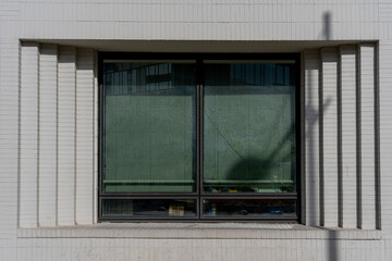 Wall Mural - Gennevilliers, France - 04 06 2022: Eco-neighborhood. View of an office window in a modern building