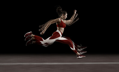 Wall Mural - Sporty young woman running