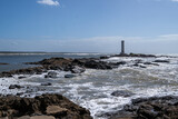 Fototapeta Las - Maritime lighthouse on beautiful beach crossing with river - Itacaré, Bahia, Brazil