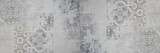 Old gray grey white vintage retro worn geometric arabesque shabby mosaic ornate patchwork motif porcelain stoneware tiles stone concrete cement wall texture background panorama