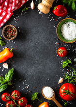 Food Frame, Ingredients For Cooking. Food Cooking Background On Black Stone Table. Fresh Vegetables, Herbs And Spices. Top View With Copy Space.