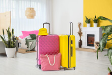 Tourist's Luggage On Floor In Bedroom. Travel Concept