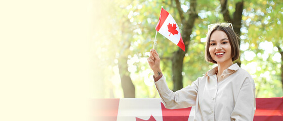 Sticker - Beautiful young woman with flag of Canada outdoors. Banner for design