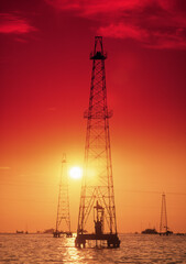 Wall Mural - Offshore oil wells at sunset, Maracaibo Lake, Zulia State, Venezuela