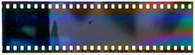 Start Of 35mm Negative Filmstrip With Cool Scanning Light Interferences