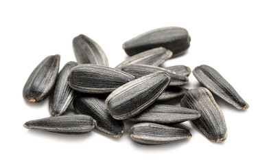 Canvas Print - Heap of unpeeled sunflower seeds on white background