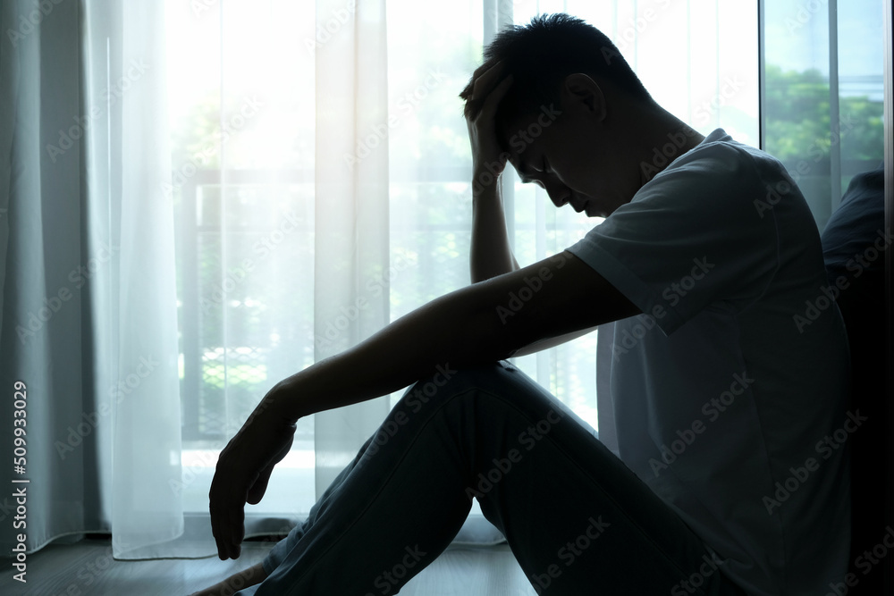 man sitting in the corner of the room have emotional and mental ...
