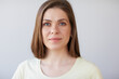 © Yuriy Shevtsov - Focused thinking woman face portrait. Girl looking away. Female head shot with shallow depth of field.