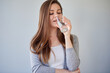 © Yuriy Shevtsov - Woman drink water and looking away. isolated portrait.