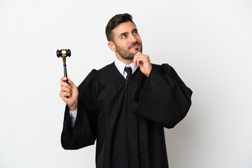 Canvas Print - Judge caucasian man isolated on white background and looking up