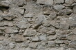 old wall made of light stone. background texture