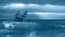 Sailing Old Ship In A Storm Sea In The Background Stormy Clouds At Sunset