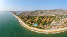 Panoramic Aerial View Of The Coastline Facing The Ocean With The Golf Court Near Freetown, Sierra Leone.