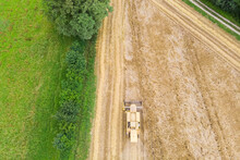 Aerial View Of A Tractor In Countryside Near Chavannaz, France.