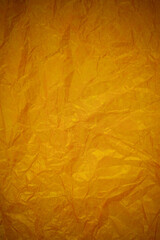 Wall Mural - Crumpled gold paper recycling background.