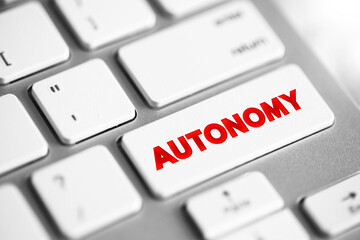 Autonomy text button on keyboard, concept background