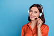 © deagreez - Portrait of attractive cheerful girl help desk answering incoming calls service isolated over bright blue color background