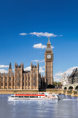 Wall Mural - Famous Big Ben with bridge over Thames and tour boat on the river in London, England, UK