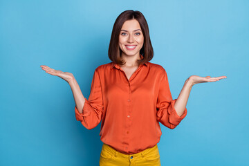 Wall Mural - photo of young pretty lady promoter hold hands solutions scales compare measure advertise isolated o