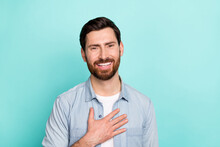 Photo Of Optimistic Guy Put Hands Chest Feel Grateful Thankful Charity Isolated On Cyan Color Background