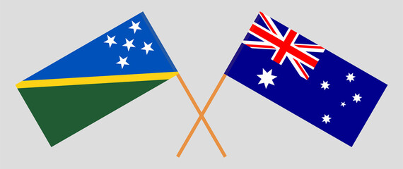 Crossed flags of Solomon Islands and Australia. Official colors. Correct proportion